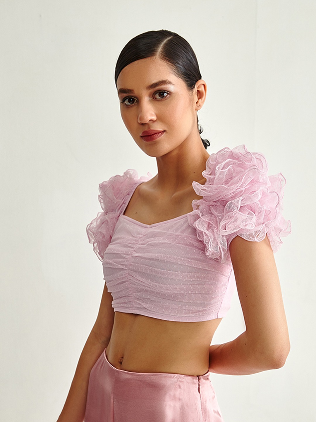 Pink ruffle top hotsell