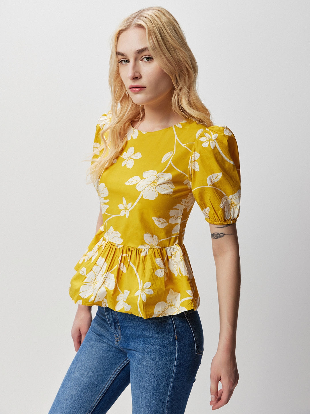 Women Yellow Floral Peplum Top at Rs 828.00
