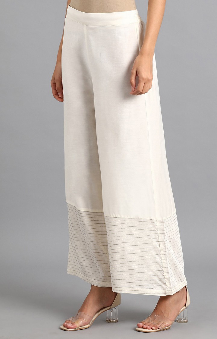 Buy online White Solid Relaxed Fit Straight Laced Hem Palazzo from bottom  wear for Women by Valles365 By S.c. for ₹699 at 65% off | 2024 Limeroad.com