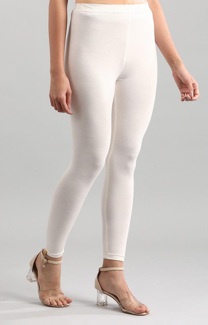 Aurelia Bottoms : Buy Aurelia Off- White Solid Tights Online