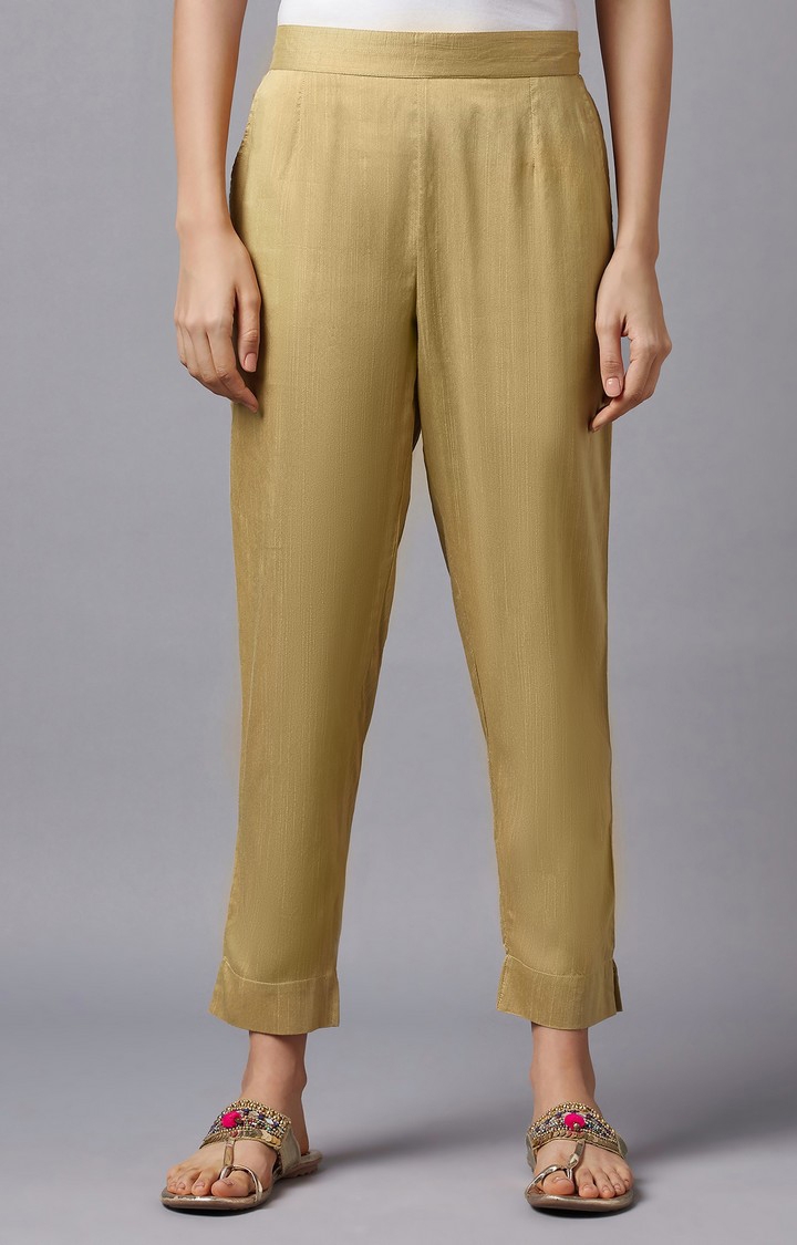 Buy Golden Solid Coloured Pants - Trousers for Women 7677212 | Myntra