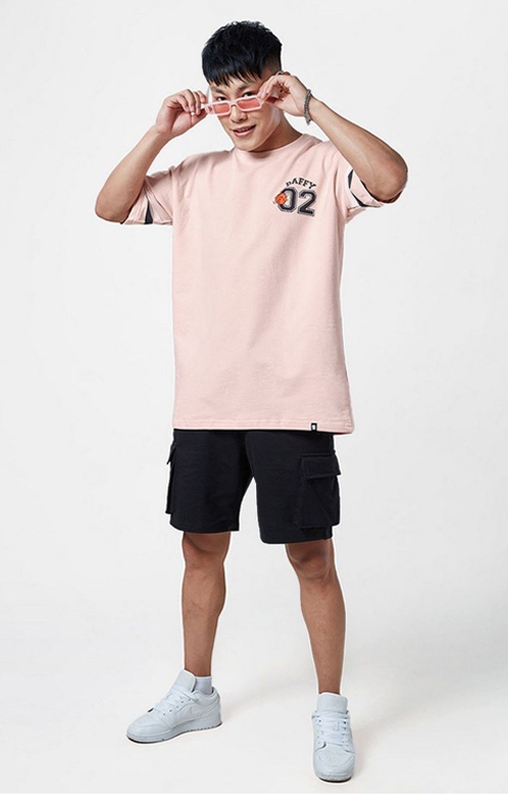 Men's Looney Tunes: Daffy in Space Jam Pink Printed Oversized T-Shirt