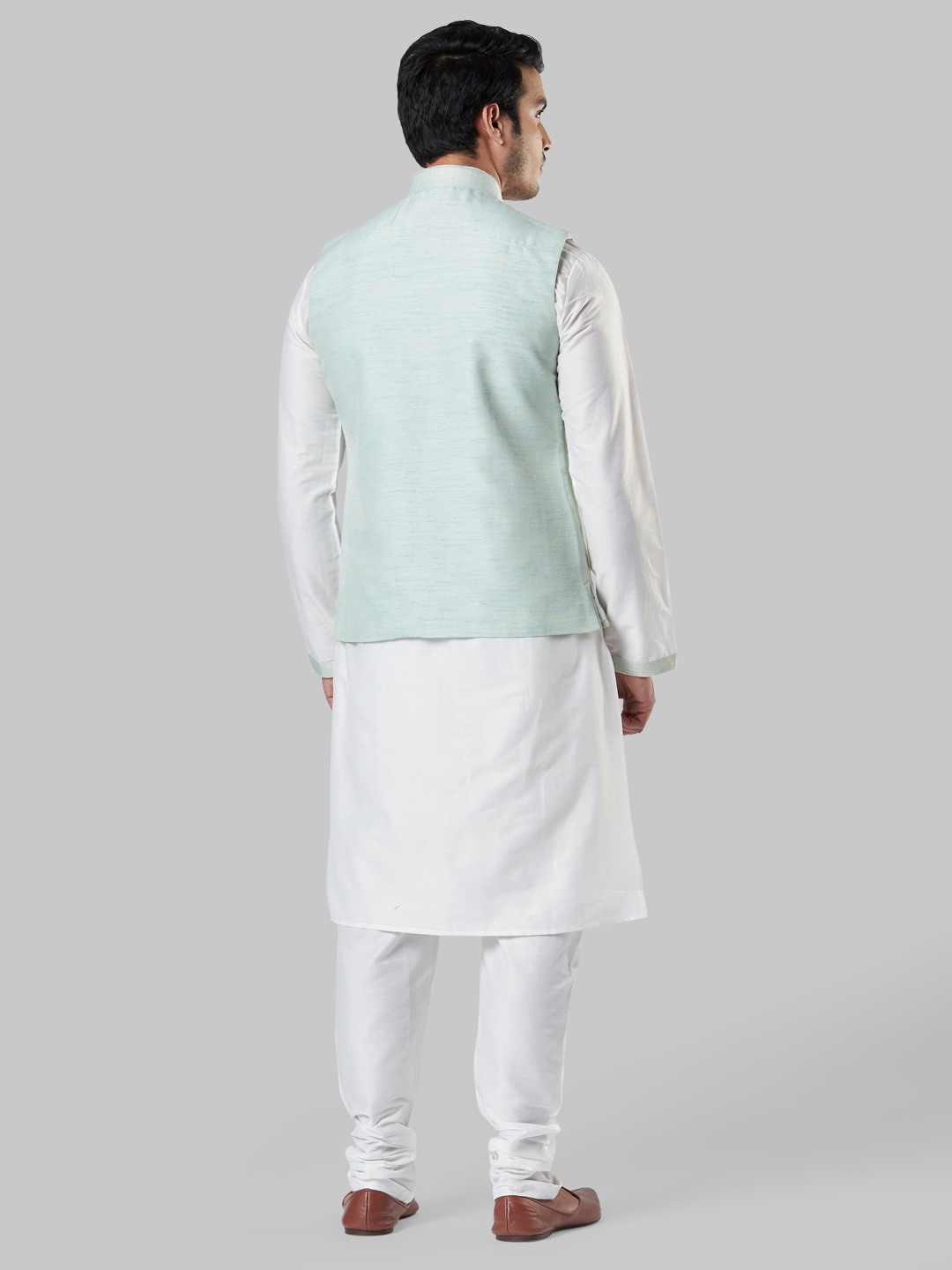 Ethnix By Raymond Light Green Kurta With Bundi And Churidar