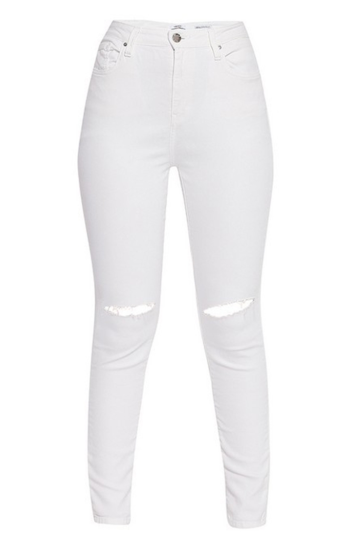 White flare jeans ripped