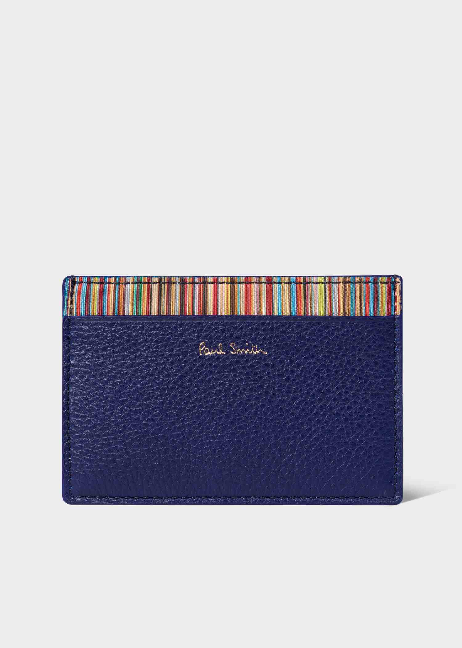 https://cdn.fynd.com/v2/falling-surf-7c8bb8/fyprod/wrkr/products/pictures/item/free/original/8WBLZomcW-Mens-Indigo-Leather-Credit-Card-Holder-With-Signature-Stripe-Trim.jpeg
