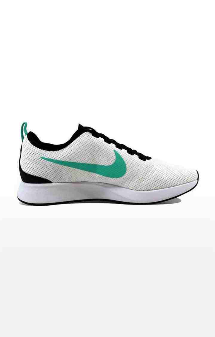 white athletic nike shoes