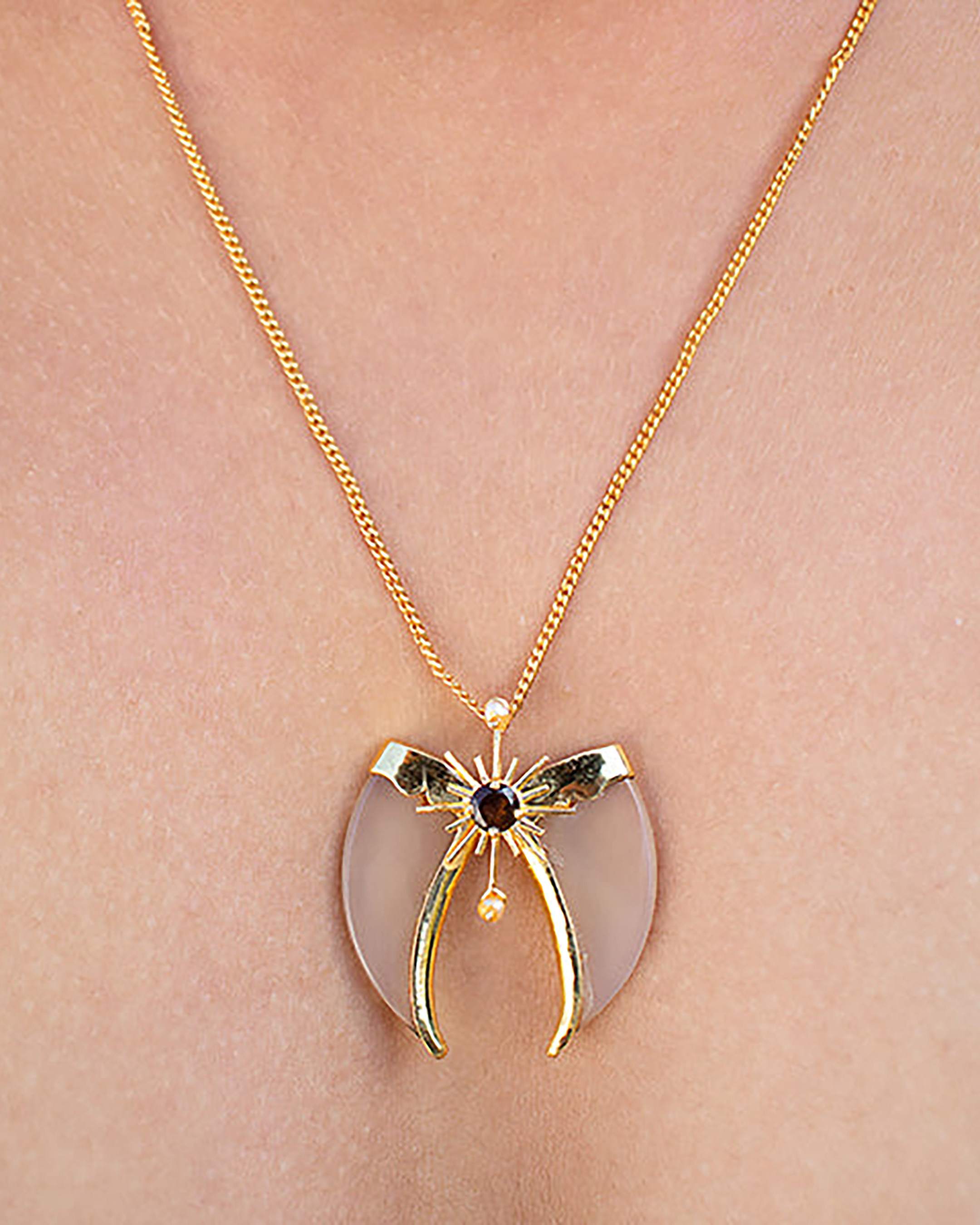 Avani Gold Faux Tiger Claw Sunburst Pendant