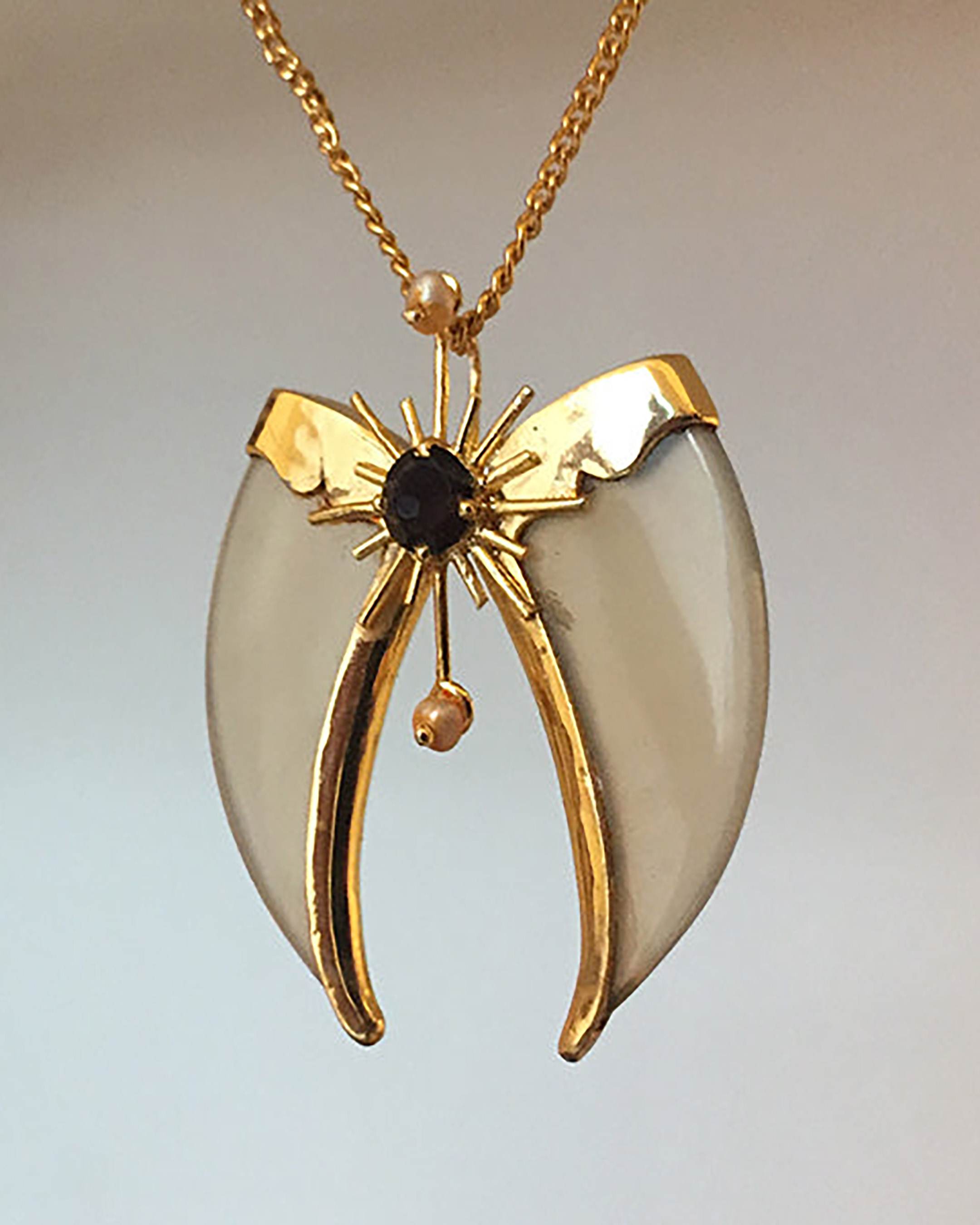 Avani Gold Faux Tiger Claw Sunburst Pendant