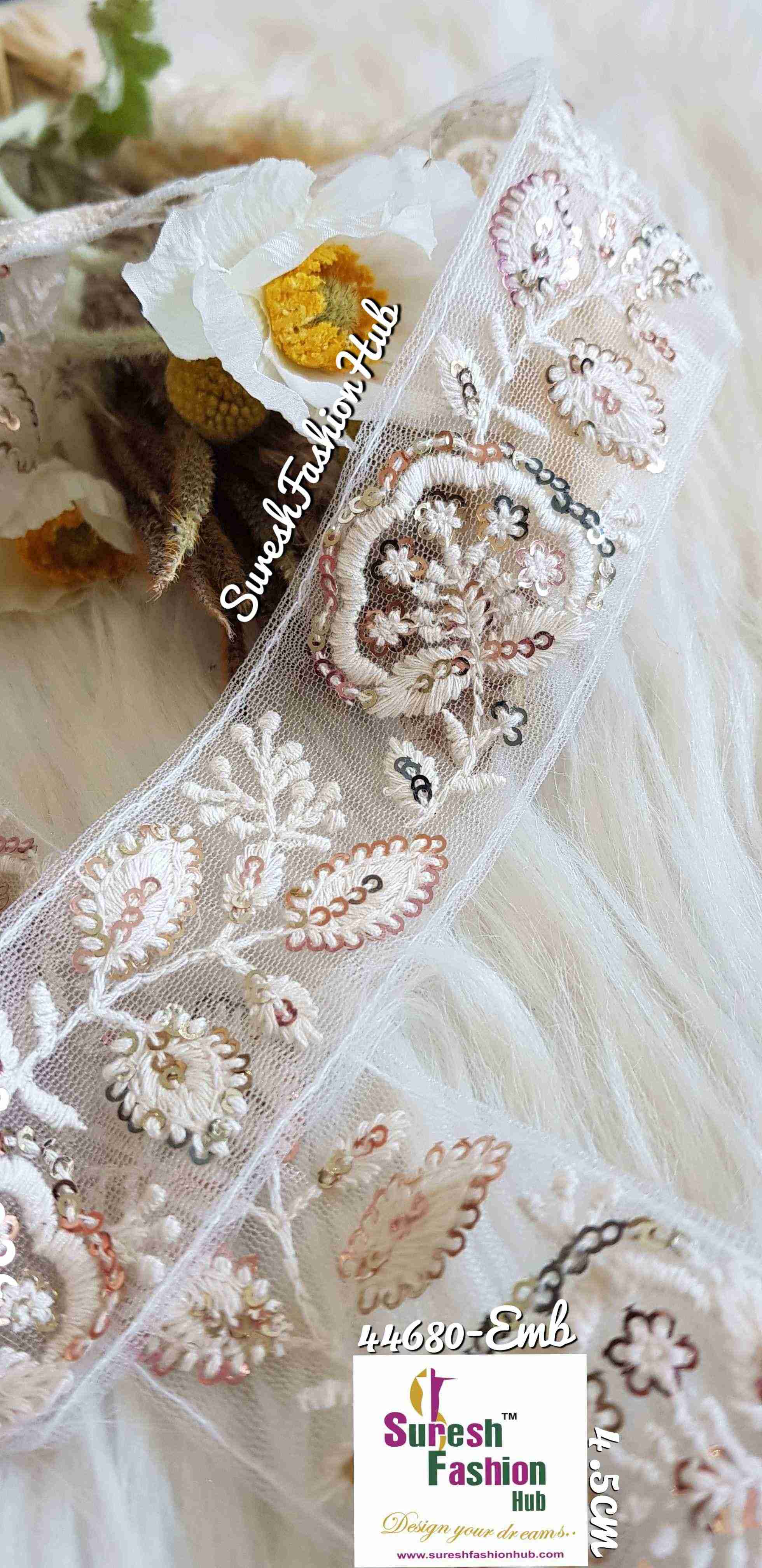 White Flowers With Multi Colored Sequence Trim