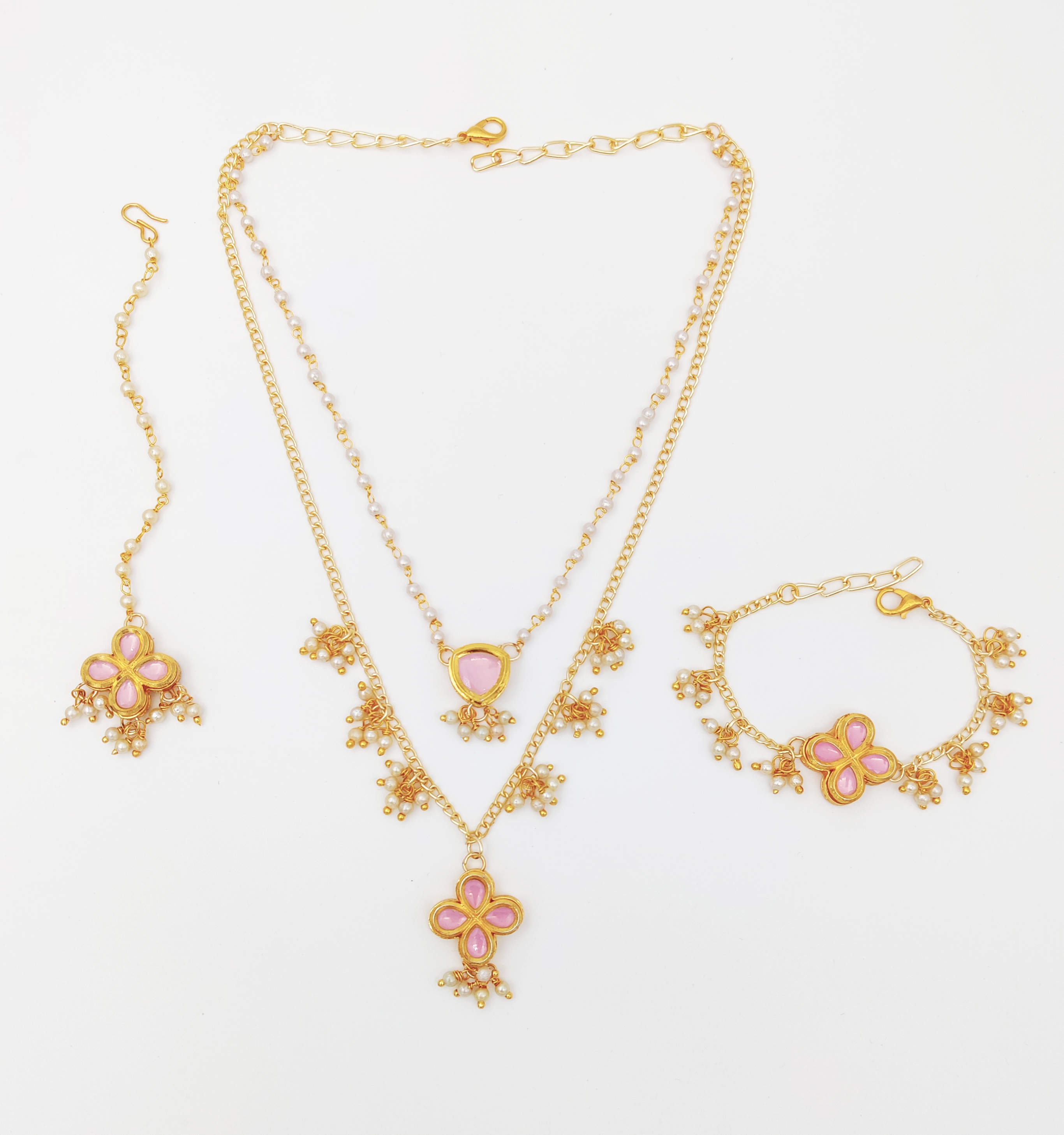 Layered Kundan & Pearl Detailed Necklace with Bracelet & Maang Teeka in Light Pink