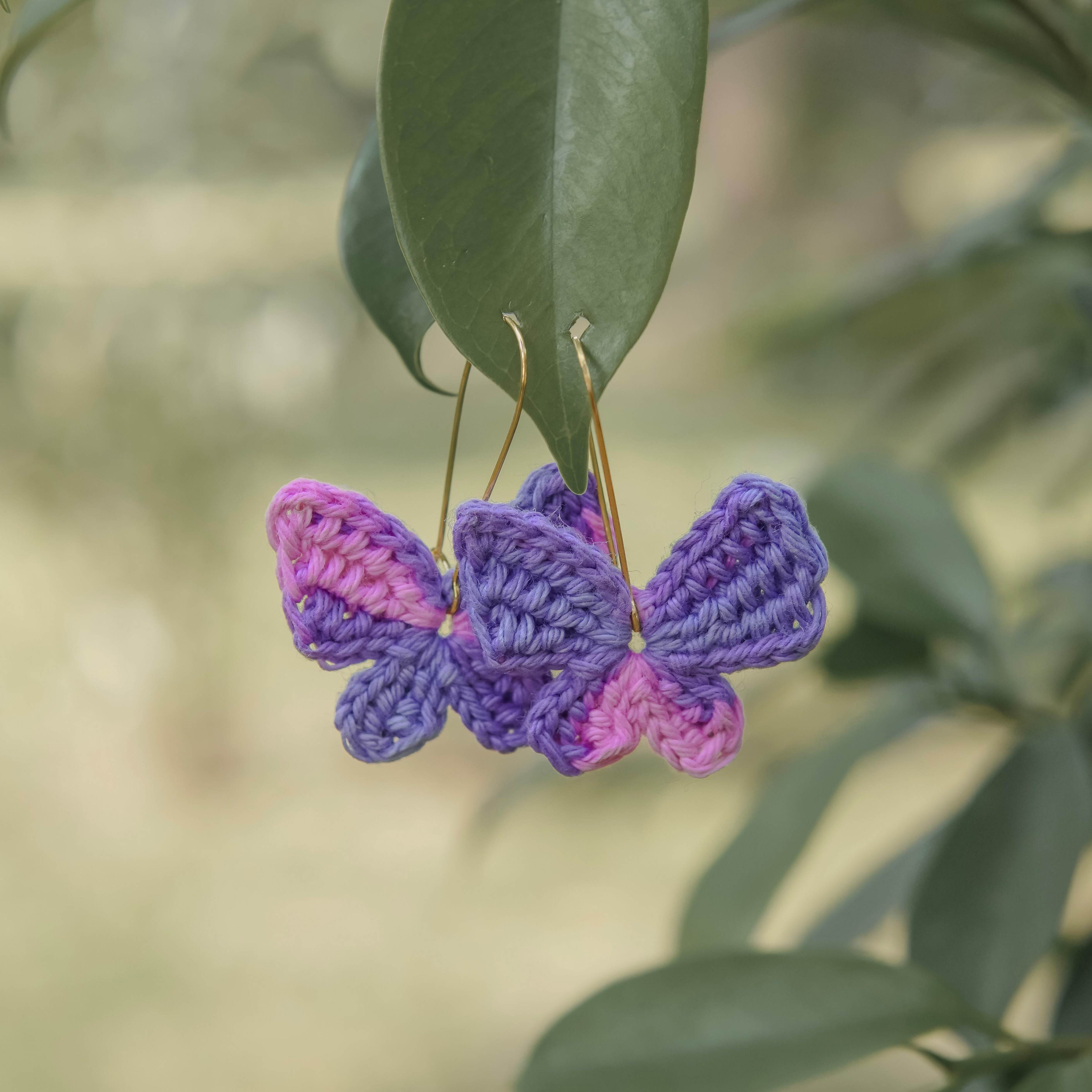 A Handcrafted Gaatha - Pink & Purple Titli Crochet Earrings. Whimsical butterflies for your ears!
