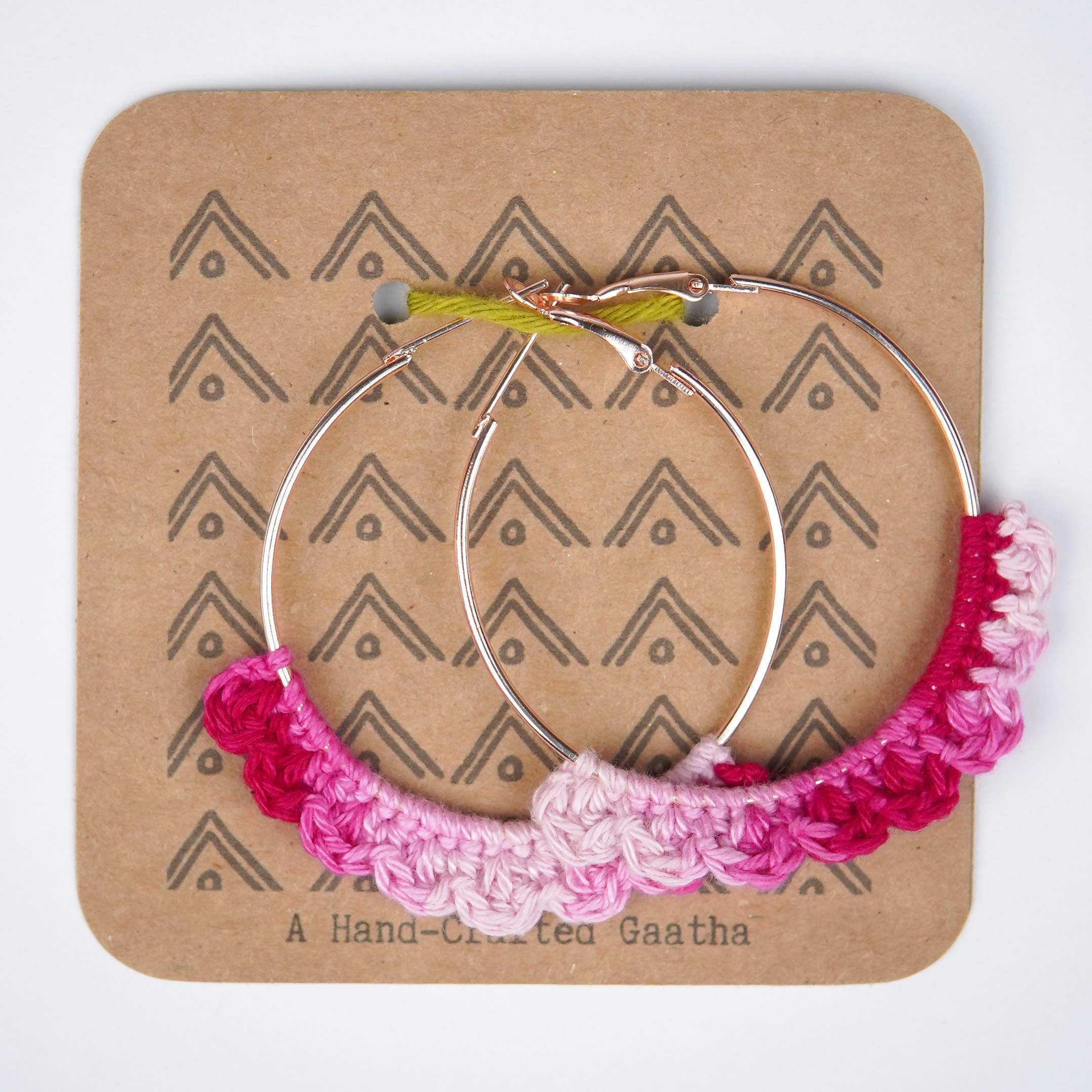 Close-up of AHG's Dual Pink Crochet Nazakat Hoops. Delicate crochet in two shades.