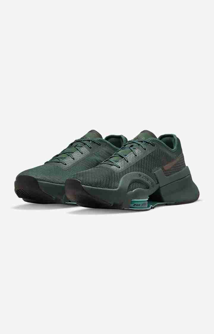 Dark green nike discount shoes