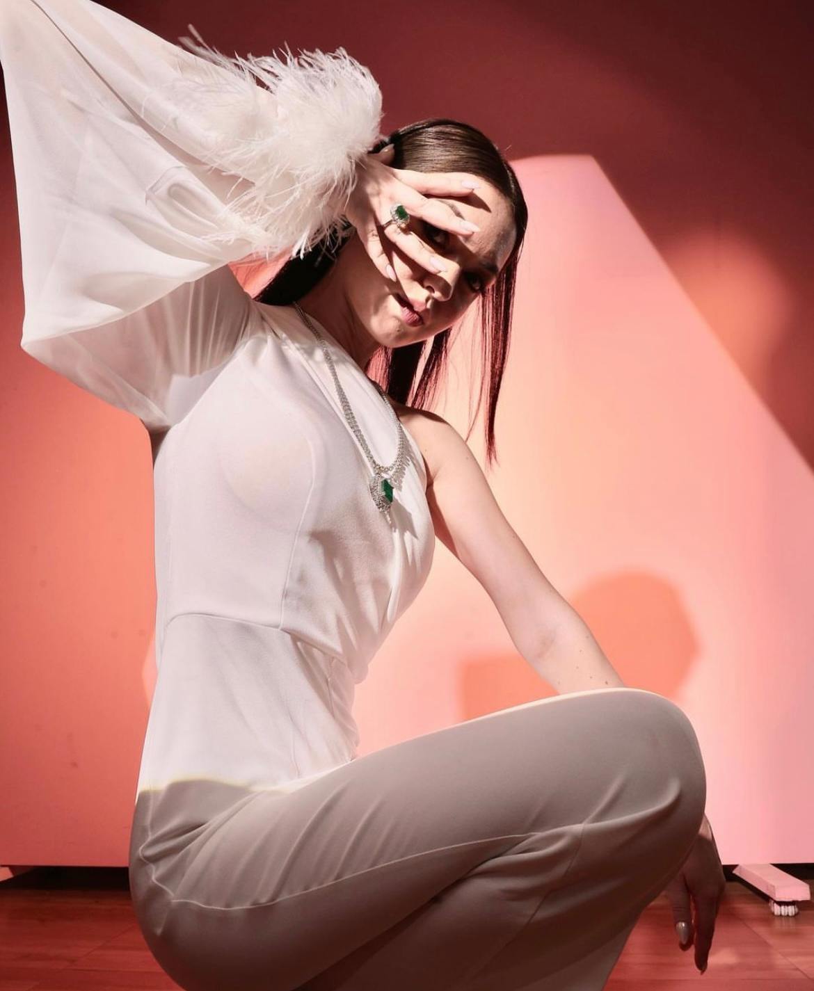 White off shoulder feather jumpsuit