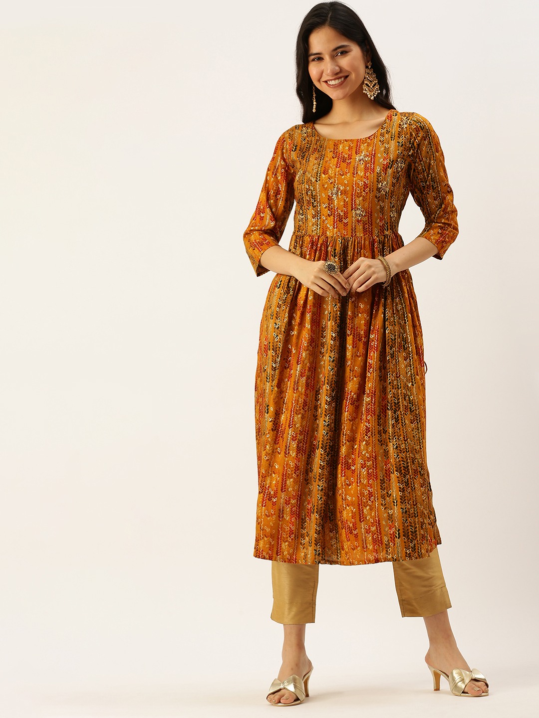 Showoff | SHOWOFF Women Mustard Ethnic Motifs Round Neck Three-Quarter Sleeves Mid Length A-Line Kurta 1