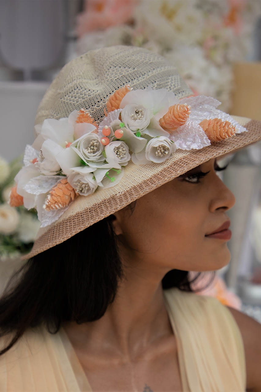 Floral art | Floral hat with white & peach flowers undefined