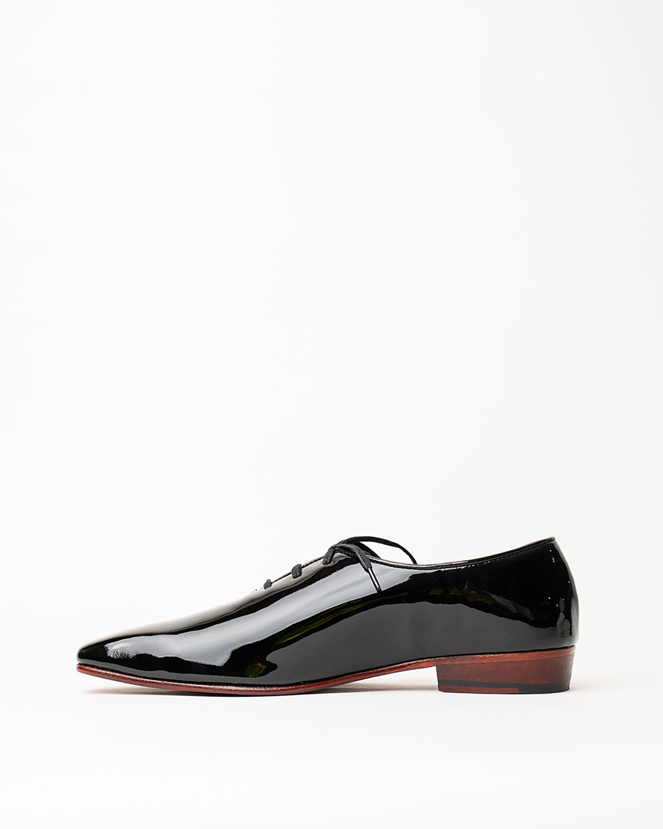 Laced Wholecut Shoes With a Square Pointed Toe and Stacked Heel