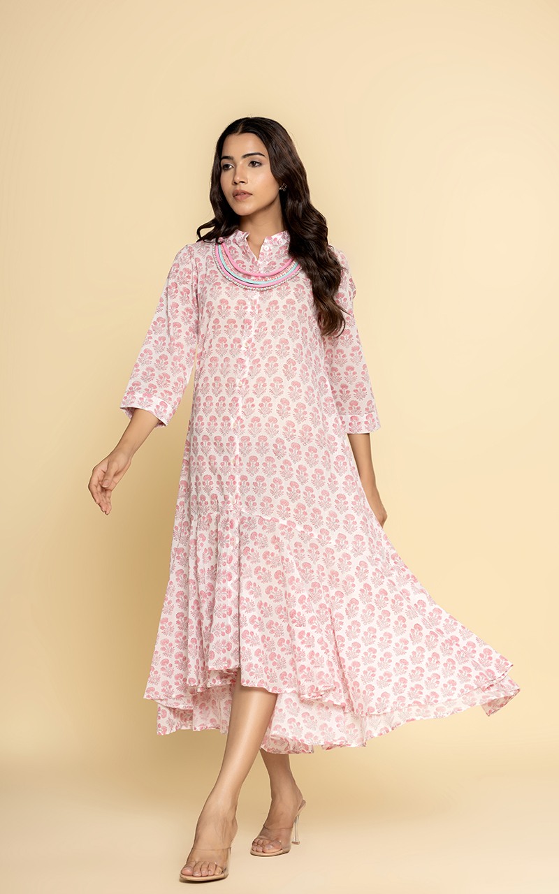 Block printed pink dress with a neckpiece
