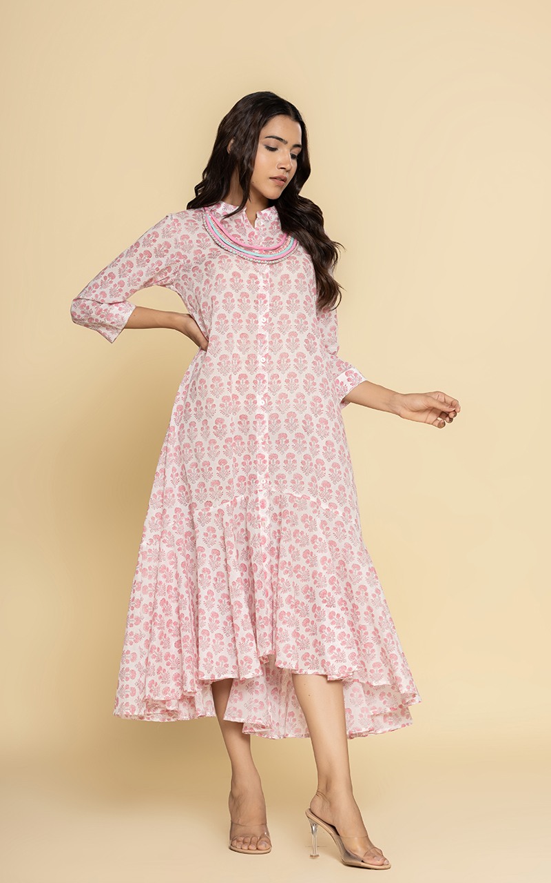 Block printed pink dress with a neckpiece