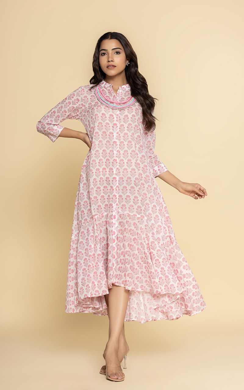 Block printed pink dress with a neckpiece