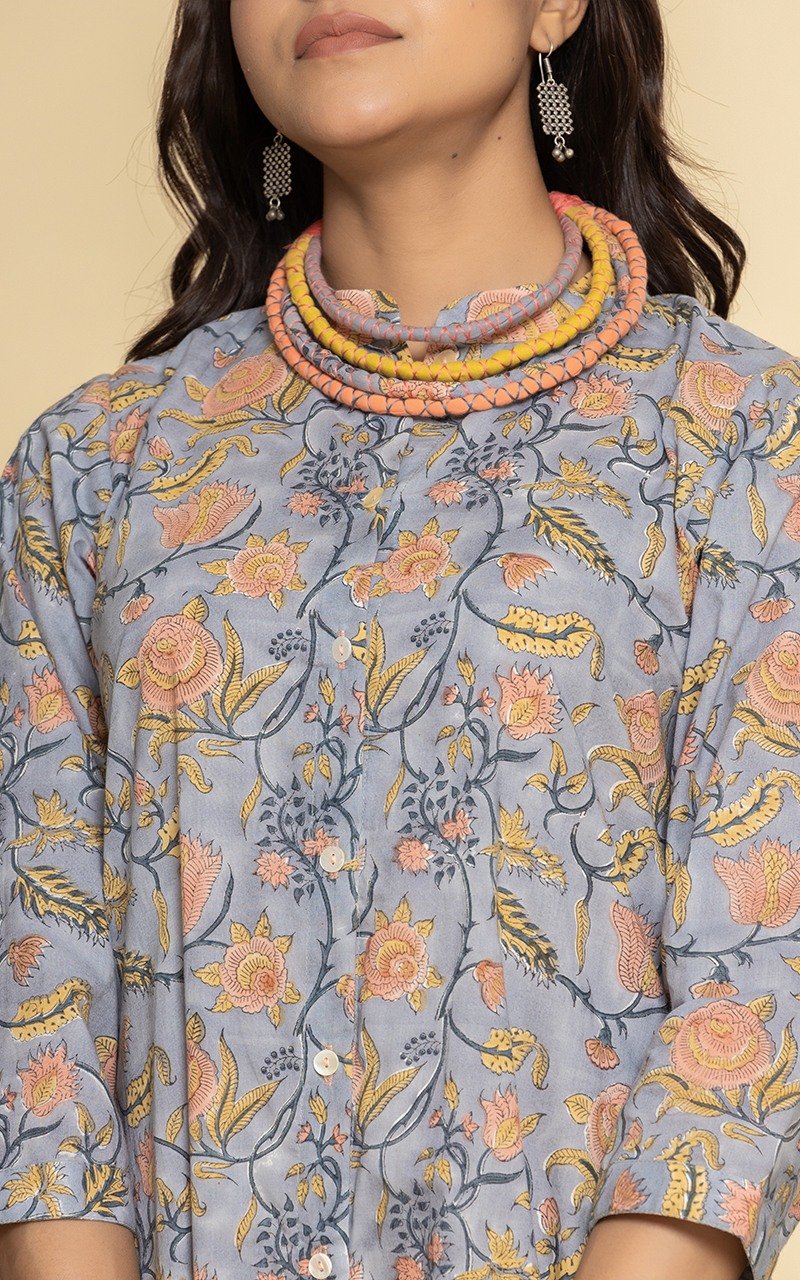Block printed grey dress with a neckpiece