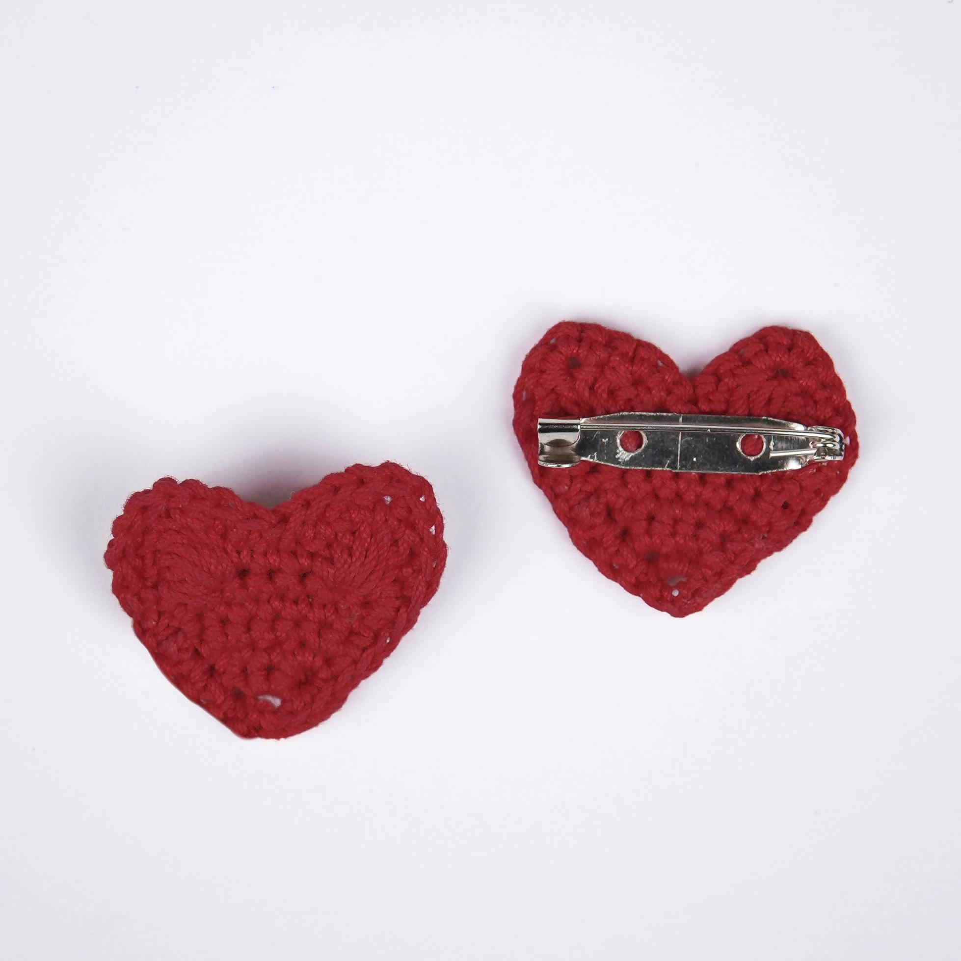  Close-up of the intricate details and rich maroon shade of the Maroon Heart Brooch by A Handcrafted Gaatha
