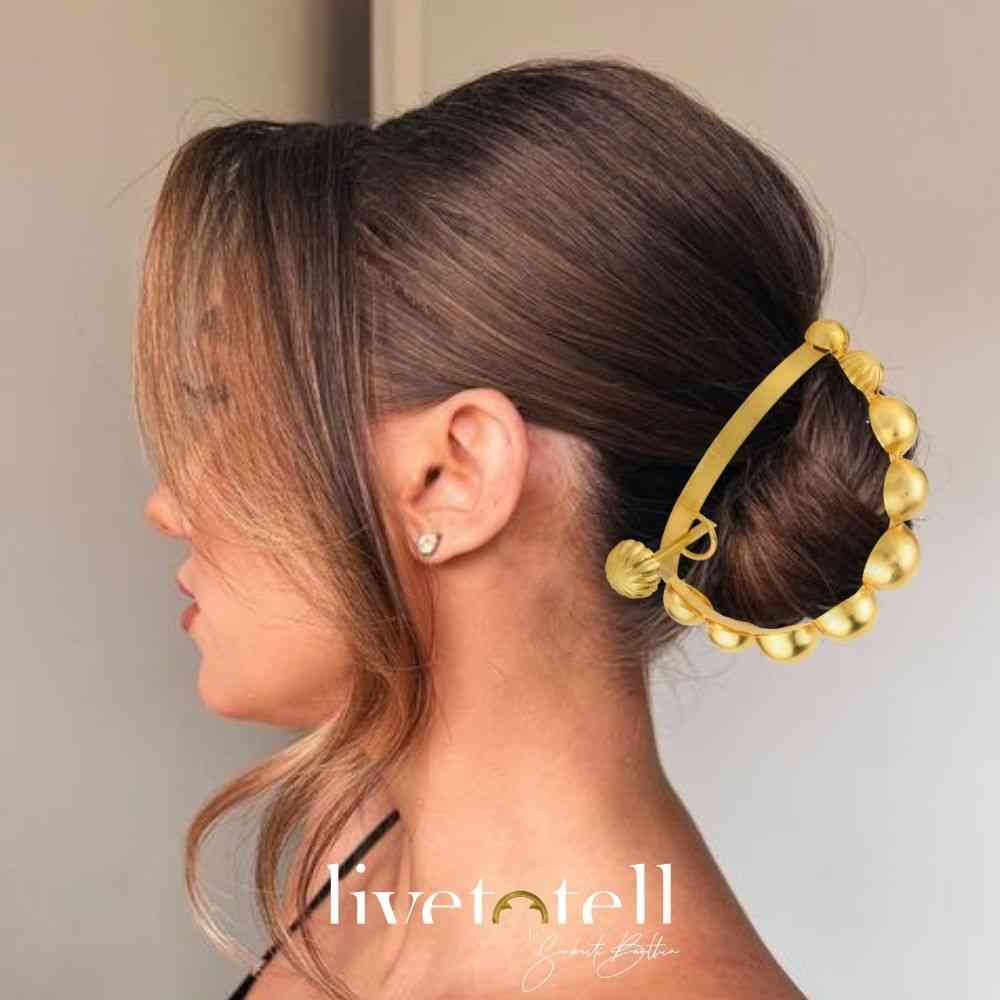 - Gold plated handcrafted hair bun ring with graduating balls - Statement hair accessory inspired by European architecture - 18k gold plated hair jewellery from Jaipur - Sculptural bun accessory for casual and festive styling