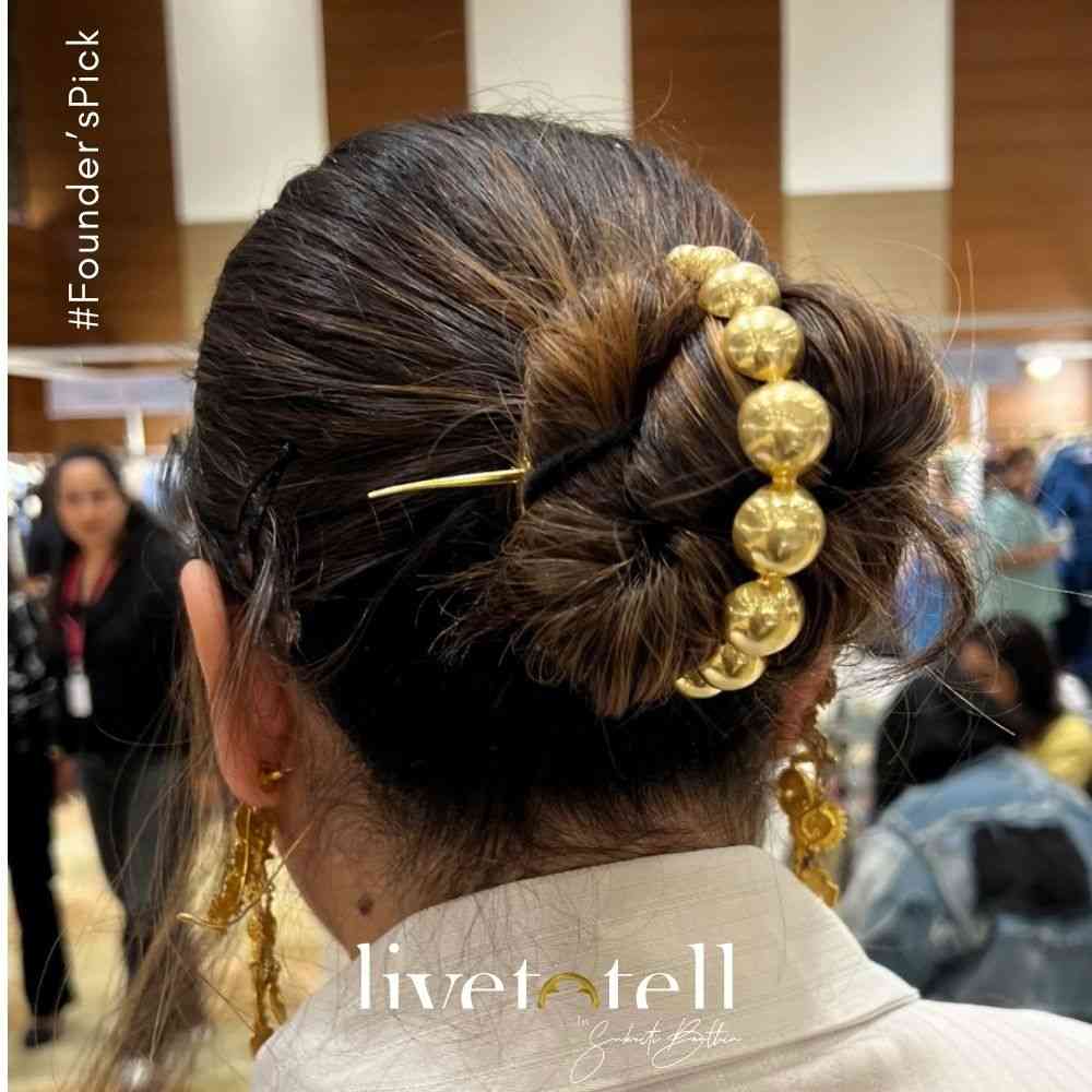 - Gold plated handcrafted hair bun ring with graduating balls - Statement hair accessory inspired by European architecture - 18k gold plated hair jewellery from Jaipur - Sculptural bun accessory for casual and festive styling