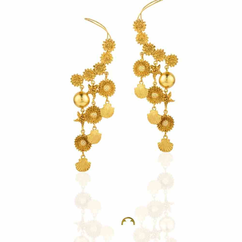 - Gold plated Jugni Pataka earcuffs with floral chaton detailing - Handcrafted earcuffs from Jaipur with cascading elements - Lightweight statement earrings in dual-wrap silhouette - Bold Indian ear jewellery for weddings and cocktail nights