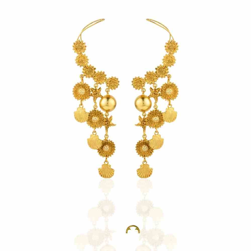 - Gold plated Jugni Pataka earcuffs with floral chaton detailing - Handcrafted earcuffs from Jaipur with cascading elements - Lightweight statement earrings in dual-wrap silhouette - Bold Indian ear jewellery for weddings and cocktail nights