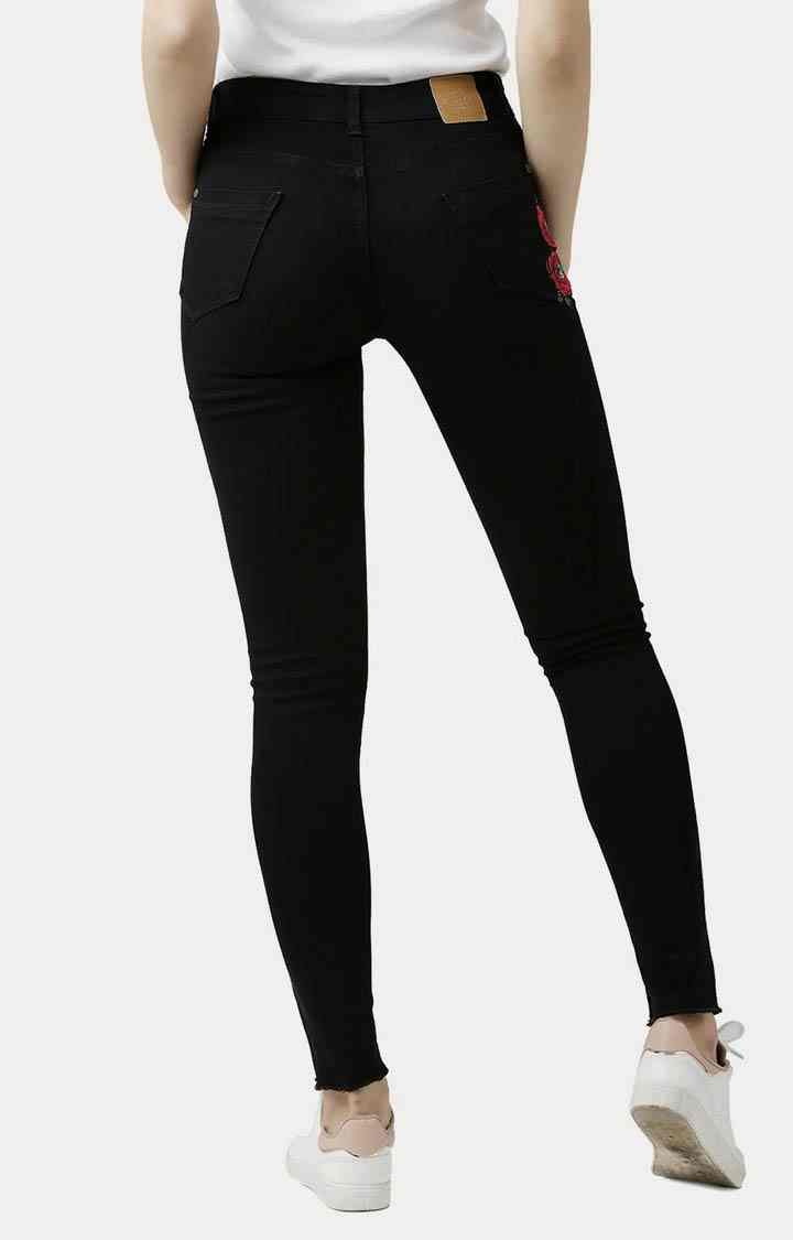 Women's Black Solid Ripped Jeans