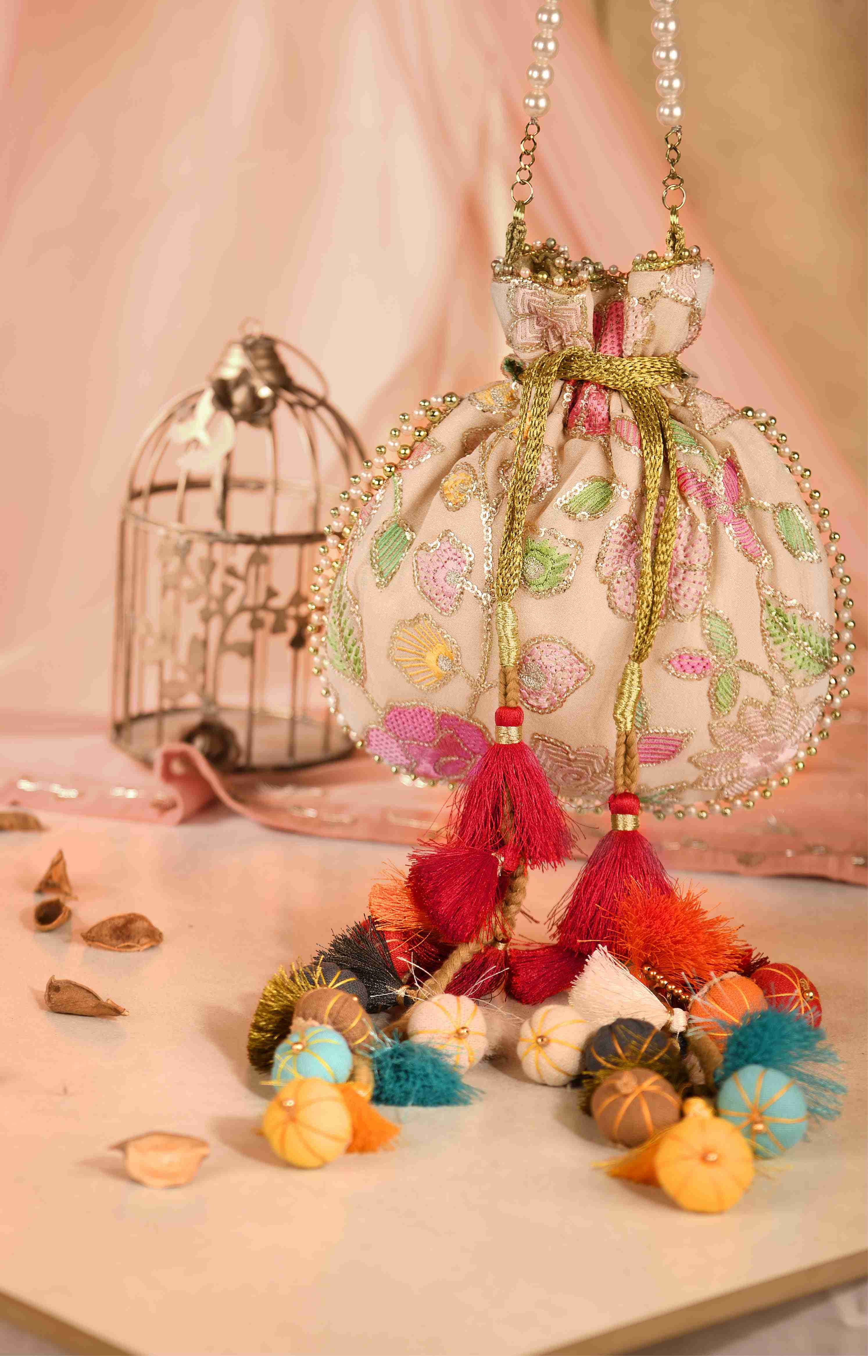 Ira Ivory Floral Embroidered Potli