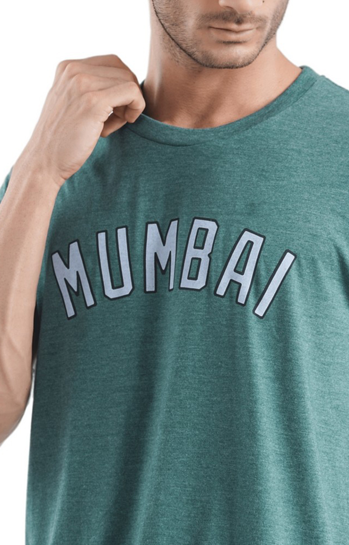Unisex Mumbai Curved Typo Tri-Blend T-Shirt in Bottle Green