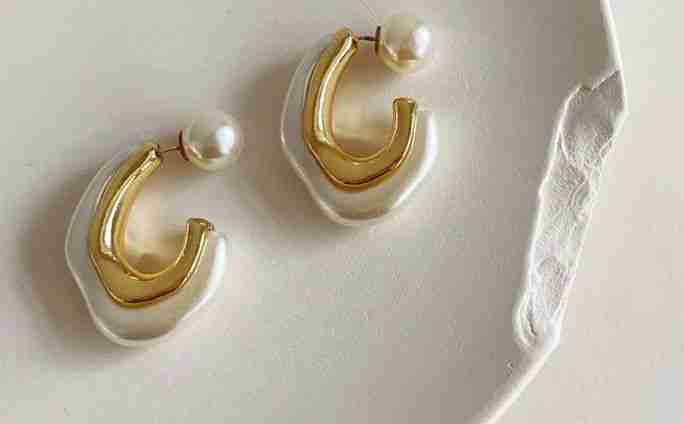 Crescent pearl half hoop earrings