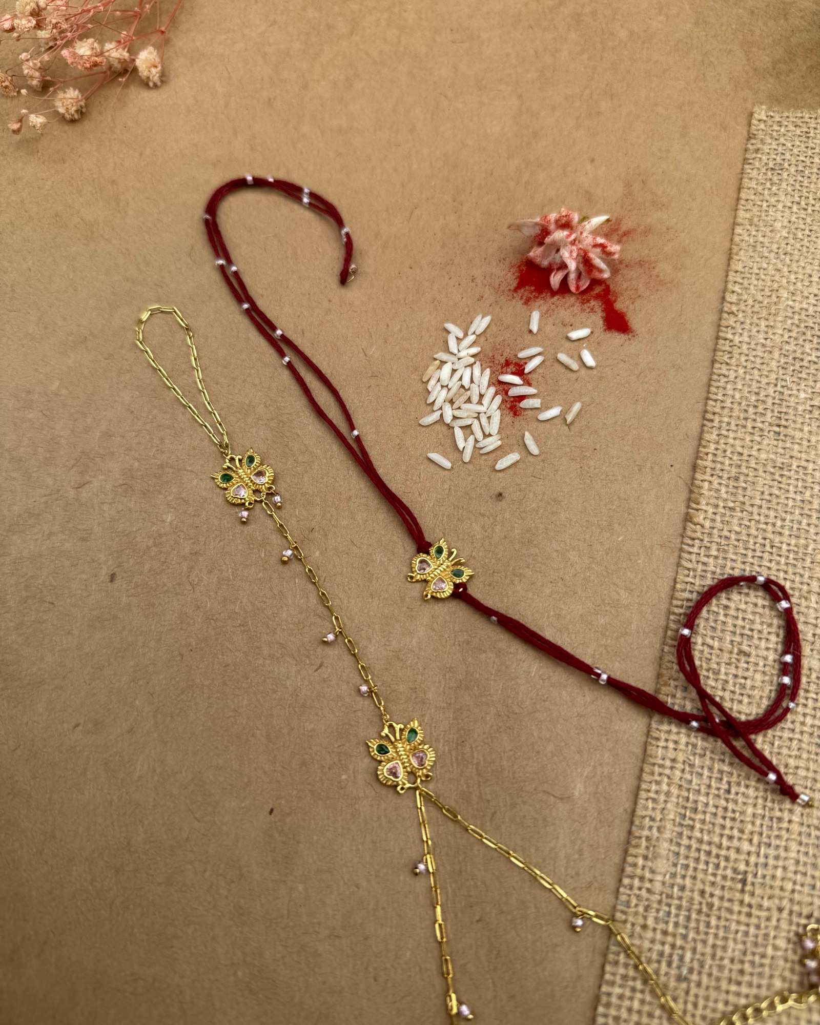 Pair Of Titli Rakhi And Hathphool