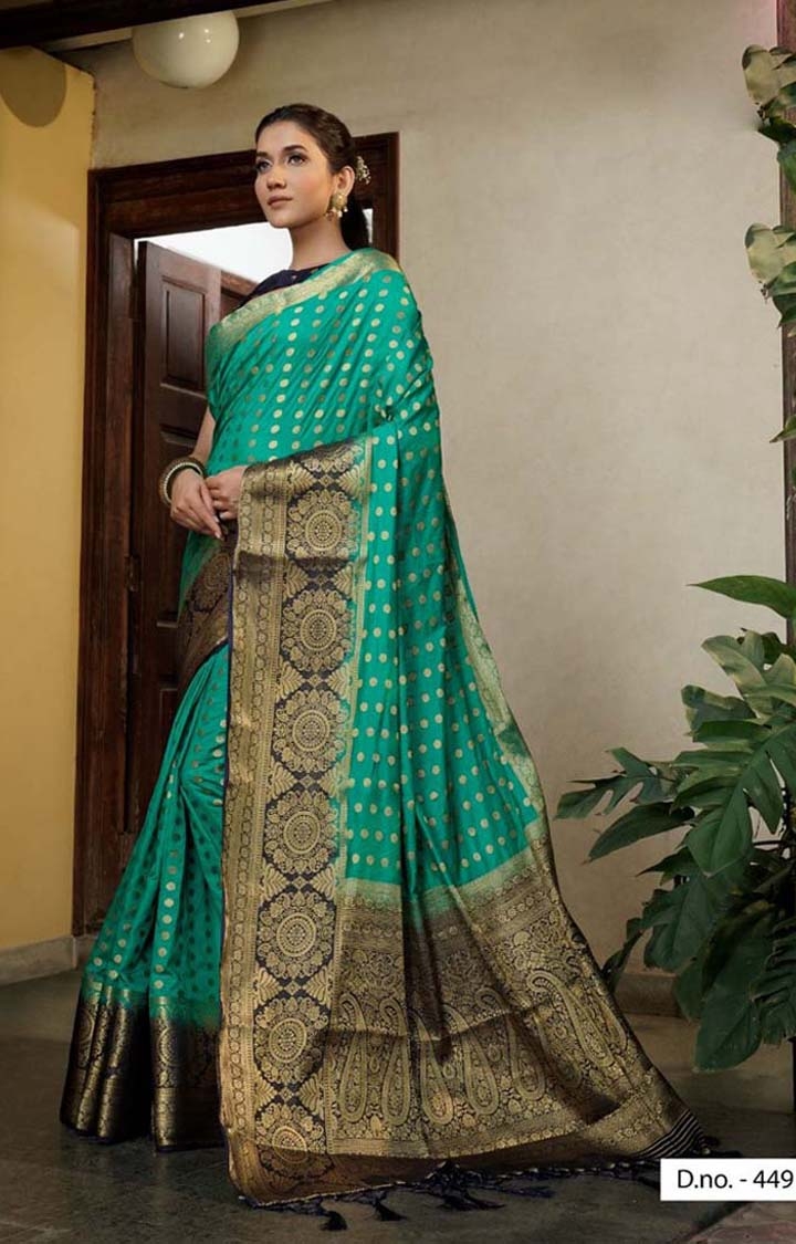 Stunning Turquoise Festive Wear Embroidered Woven Raw Silk Saree