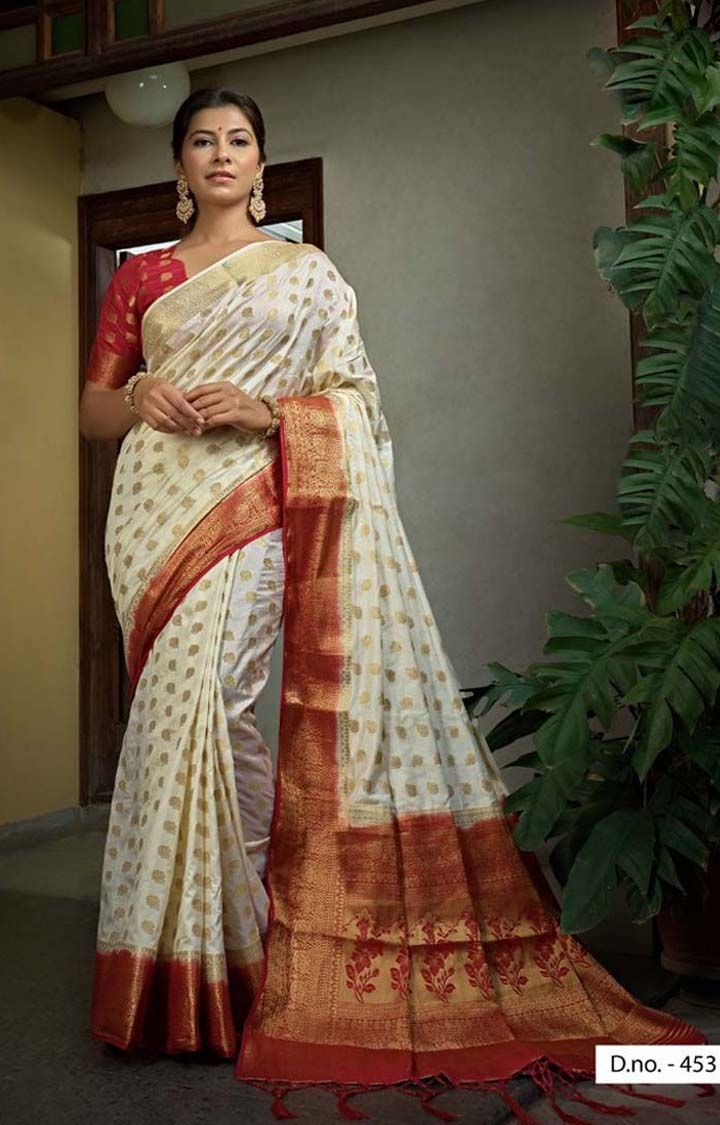 Stunning Off-White Festive Wear Embroidered Woven Raw Silk Saree