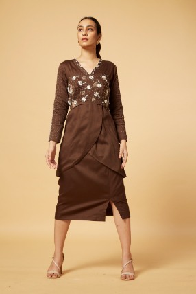Embroidered bus[er with embellished coat and skirt