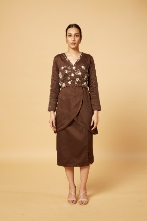 Embroidered bus[er with embellished coat and skirt