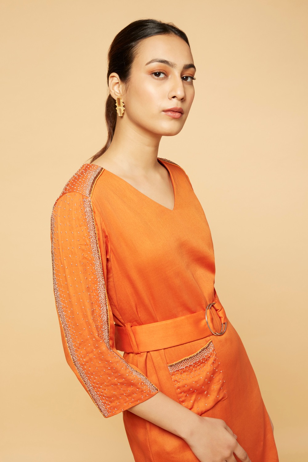 Orange sheath dress with belt