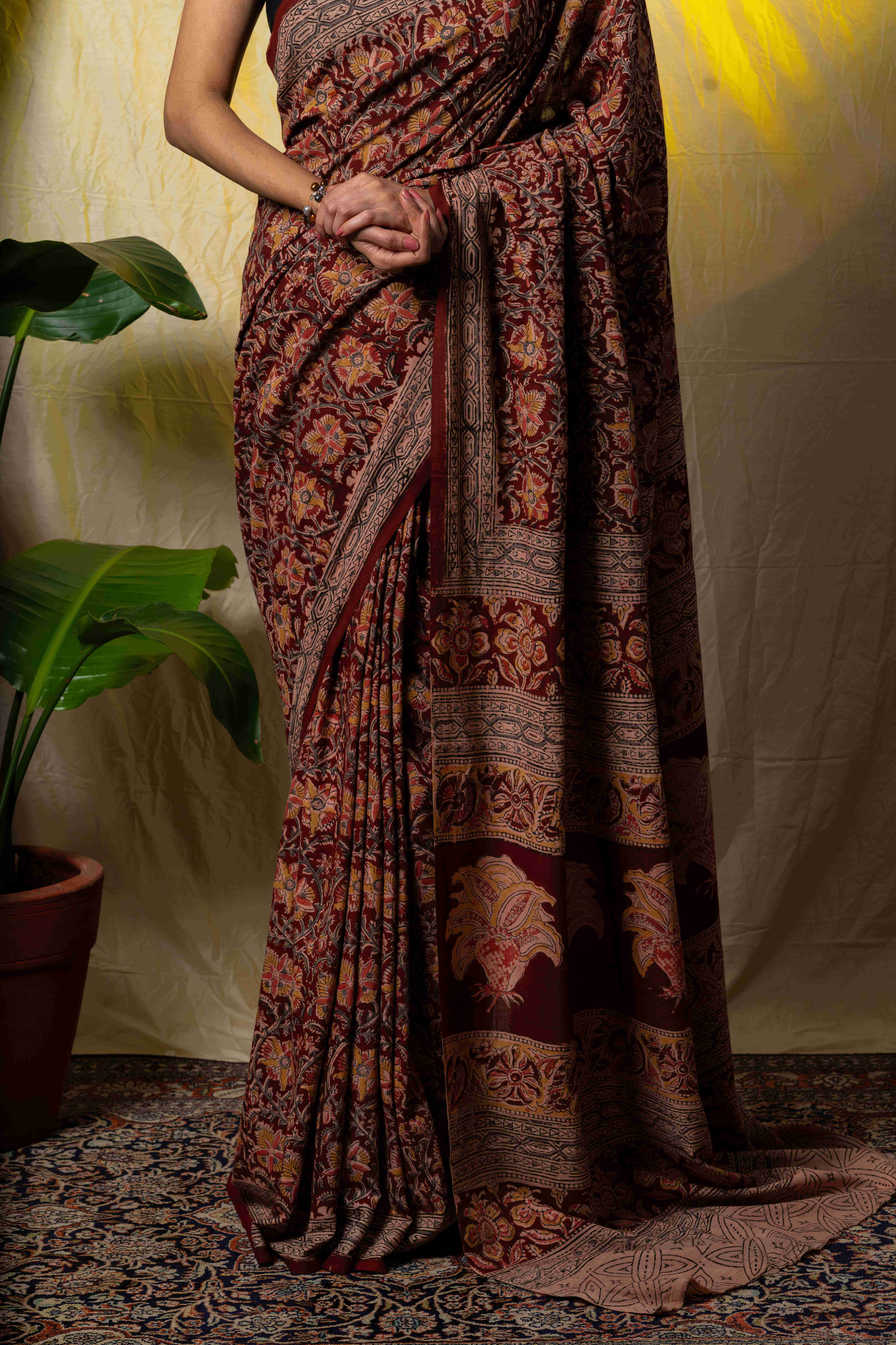 Marron handblock printed kalamkari cotton saree.