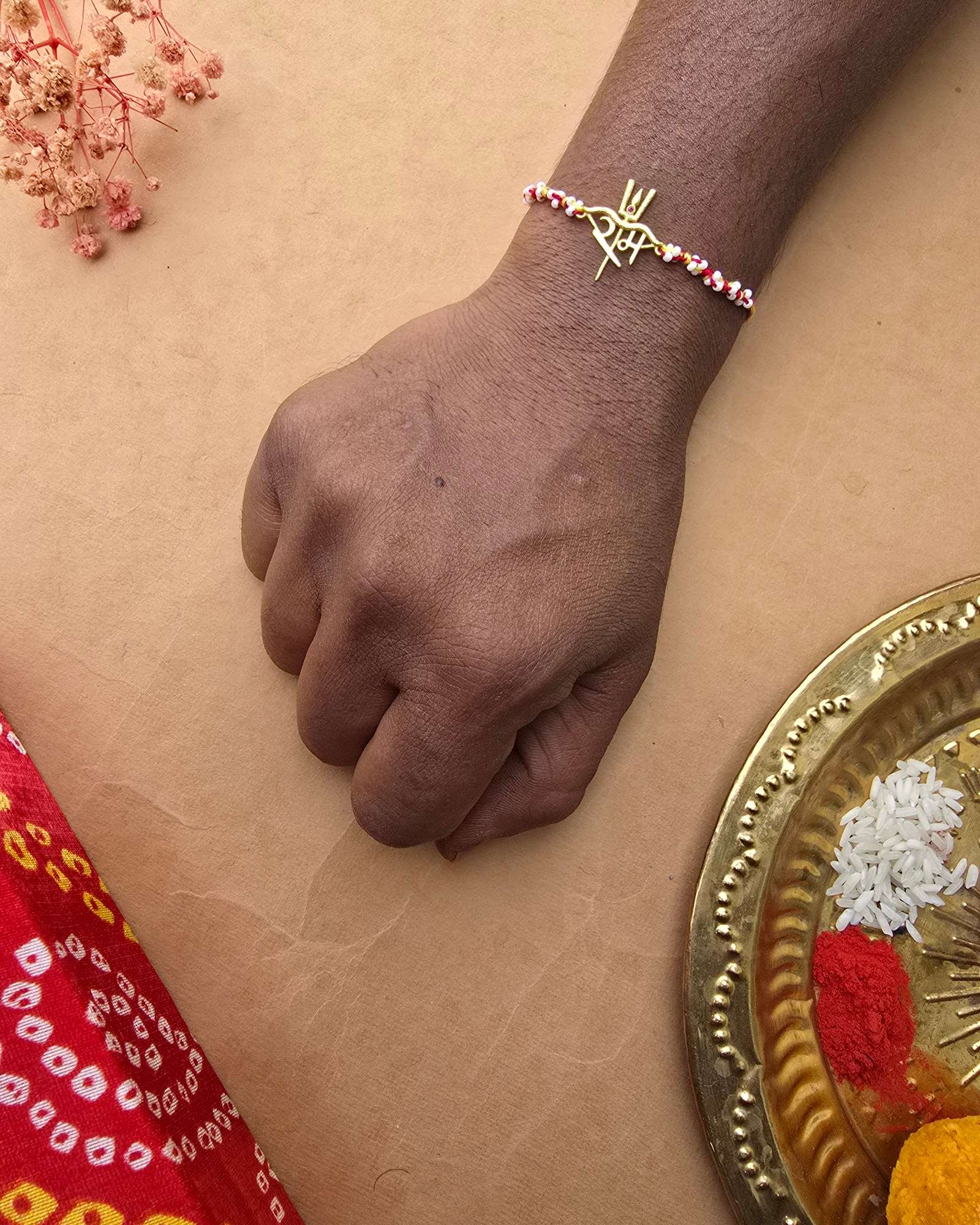 Ram Rakhi in 18k plated gold