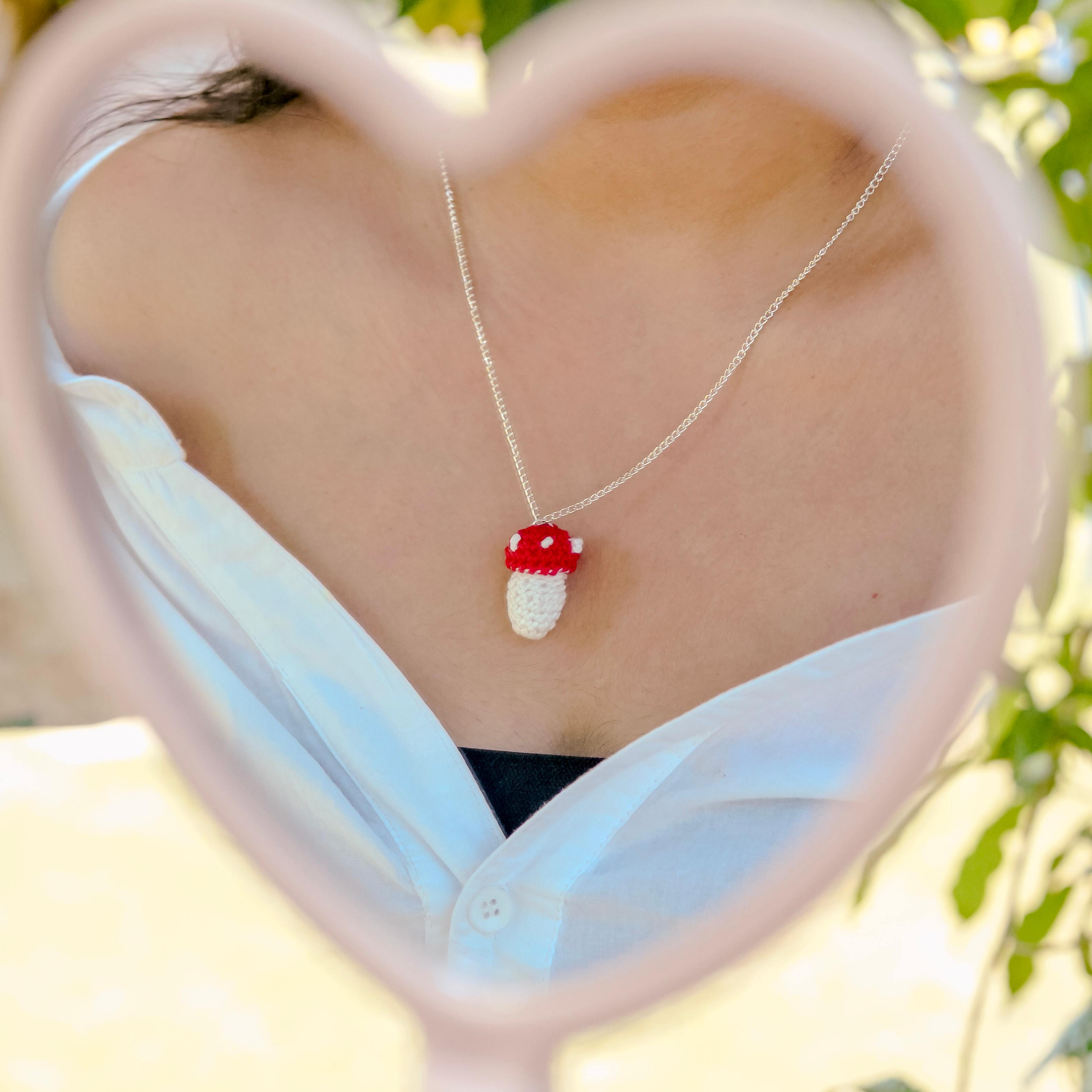 Model wearing the Mushroom Pendant by AHG. Perfect for nature lovers!