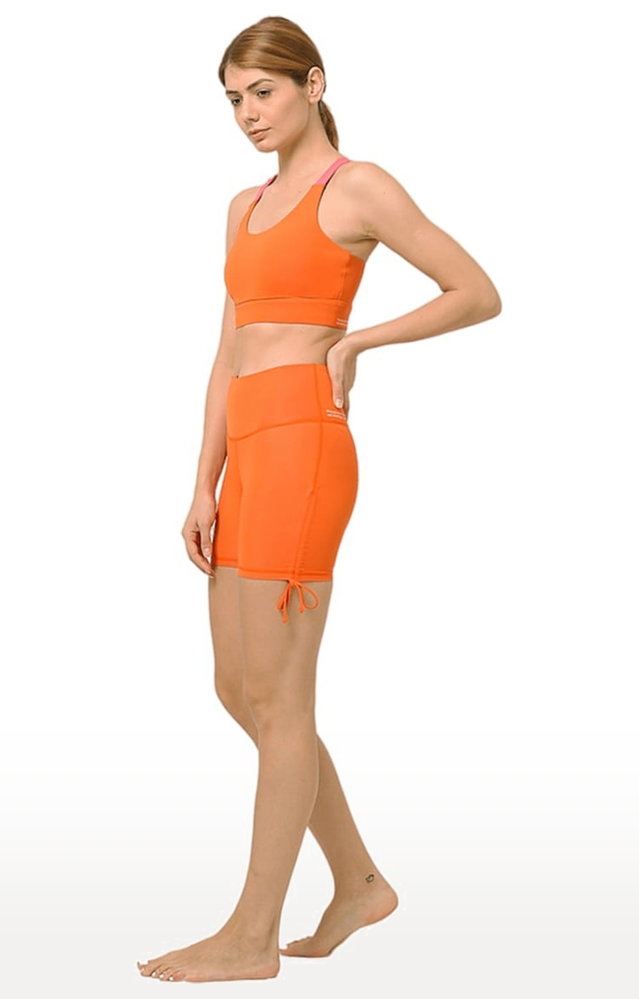 Kosha Yoga Co. | Women's buttR  Orange Yoga Short 1