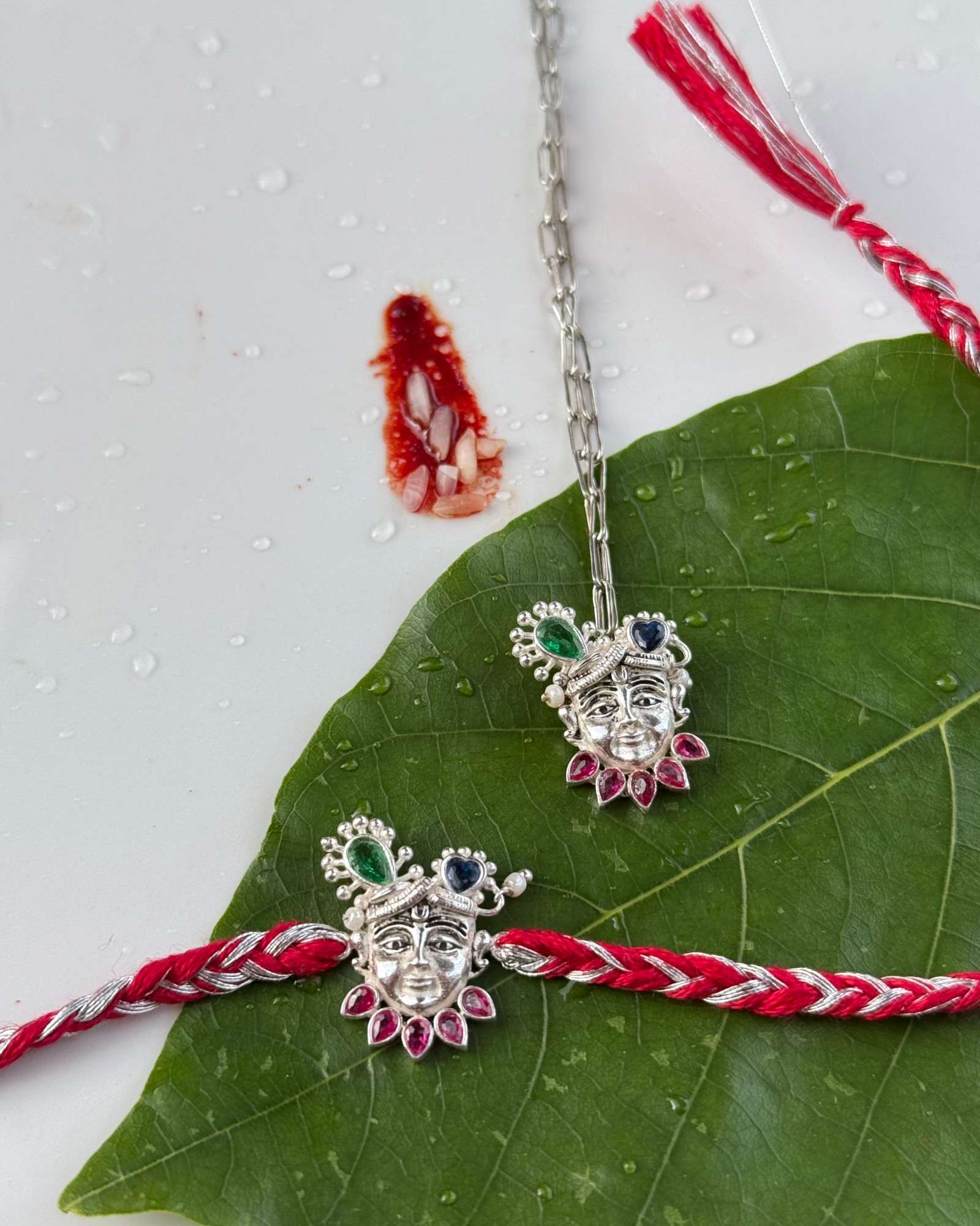 Pair Of Shreenath Swaroop Rakhi And Lumba In Silver