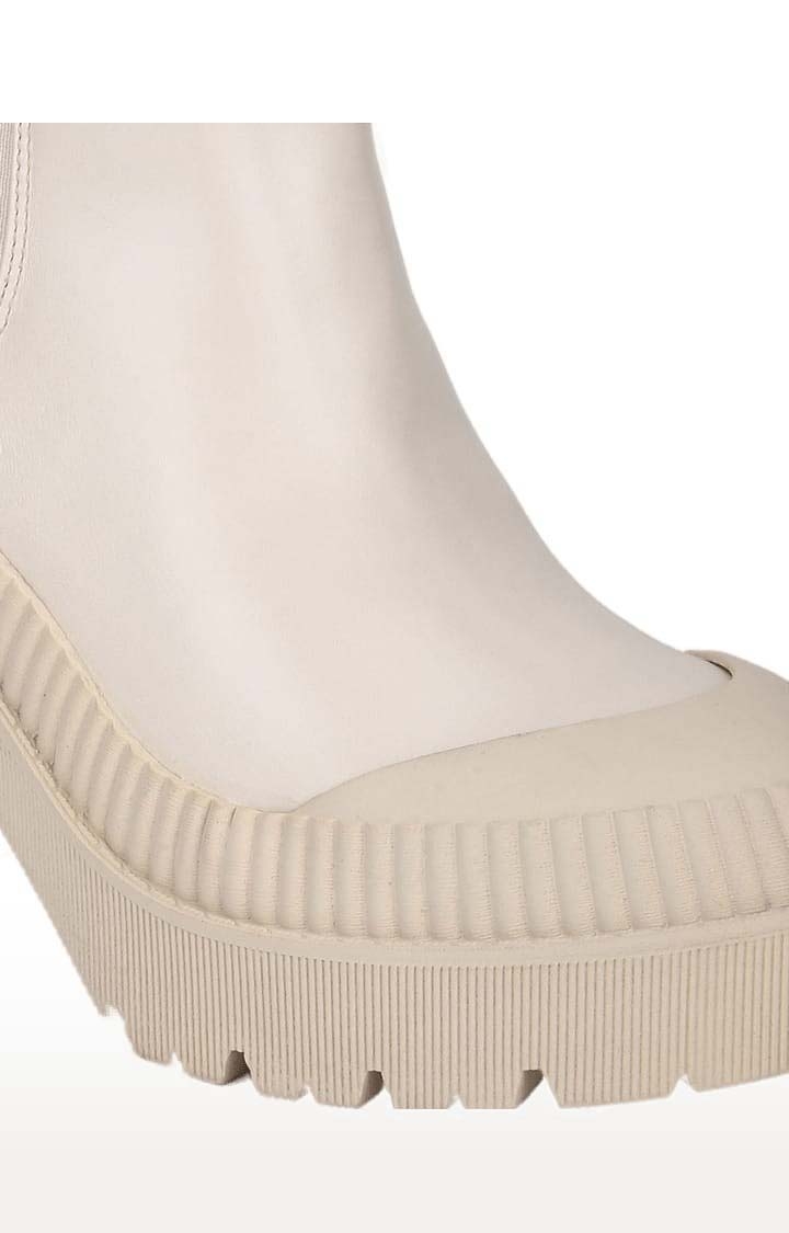 Truffle Collection | Women's Beige PU Solid Slip On Boot 4