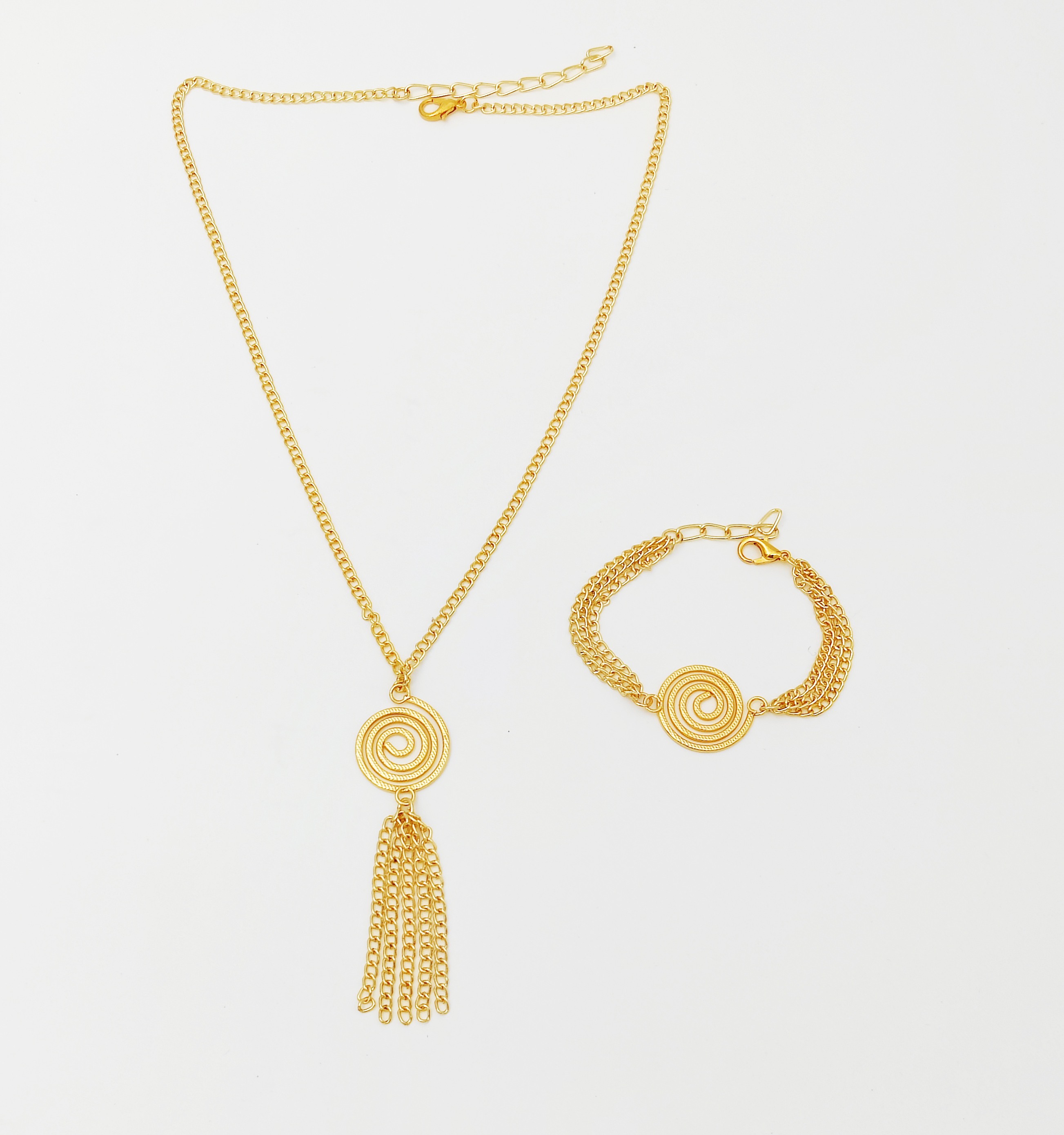 Lime By Manika | Gold Swirl Tassel Necklace & Bracelet Set undefined