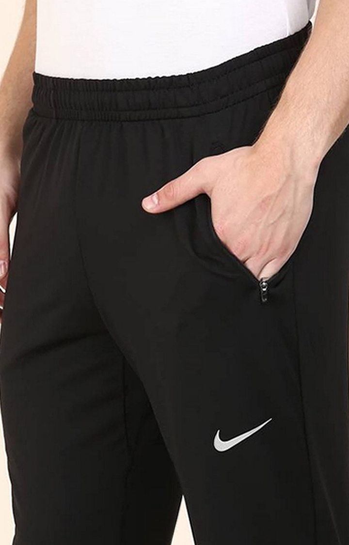 Nike DriFIT ADV APS Mens Woven Fitness Trousers Nike UK