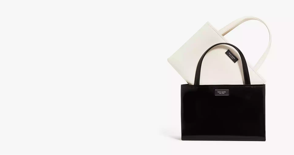 Kate Spade black patent tote with cream pouch inside