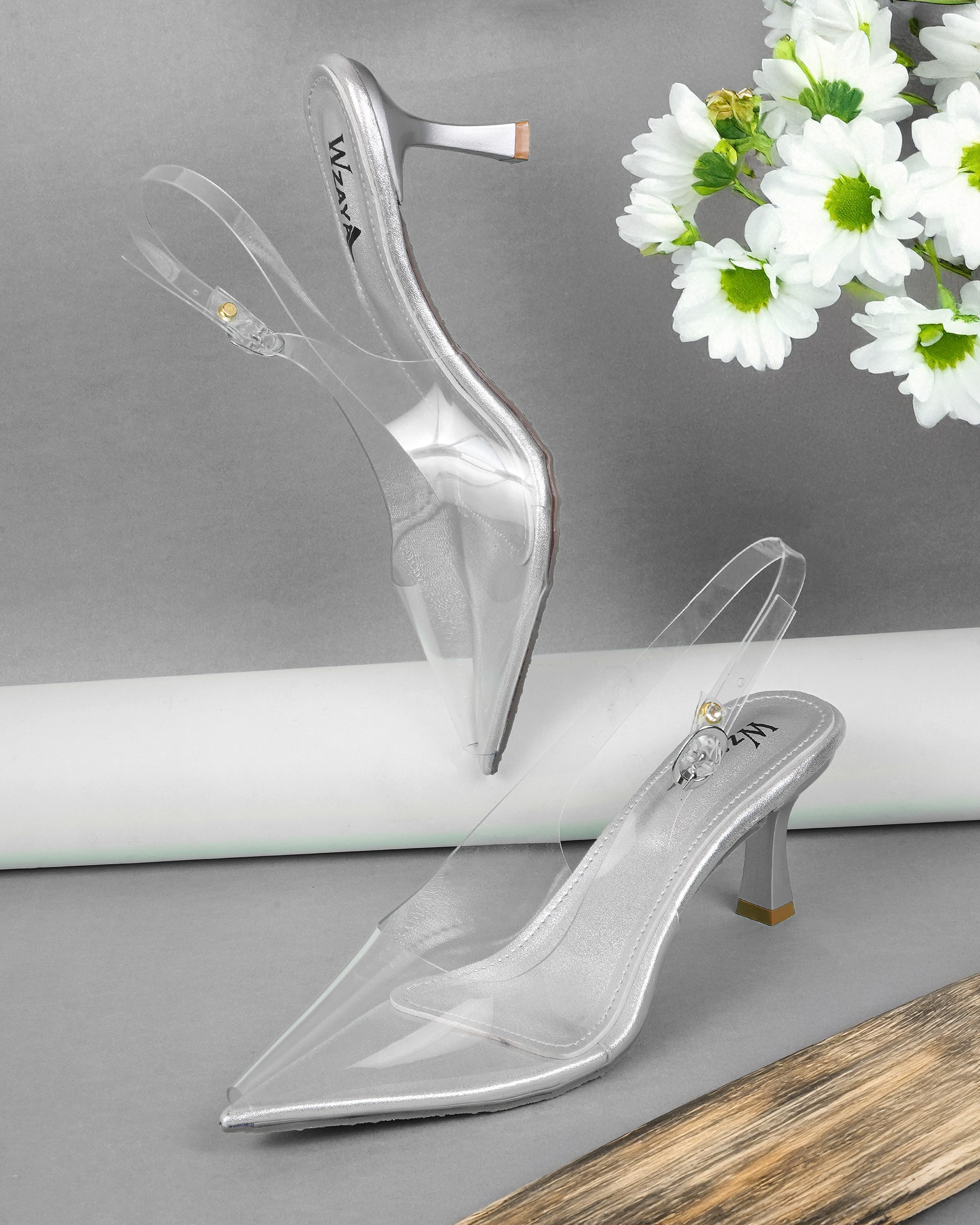 Transparent Pointed backstrap Pumps
